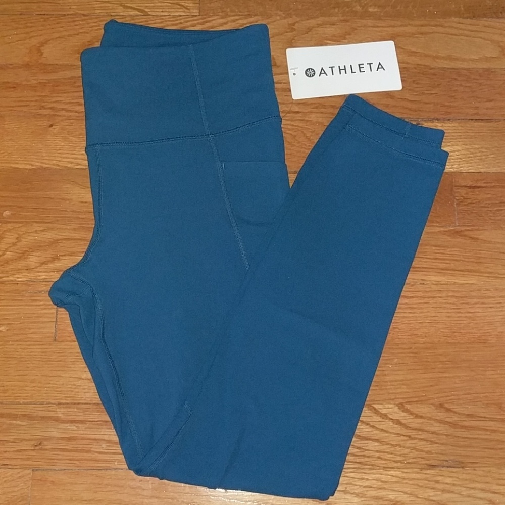 Athleta Stash Pocket Salutation Tight